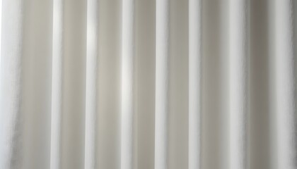 Obraz premium Elegant white fabric drapes with soft texture creating a calm and serene atmosphere ideal for backgrounds, interior design, and creative projects