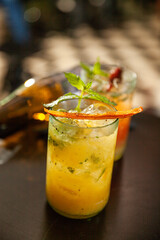 cocktail with lime, mint and mango