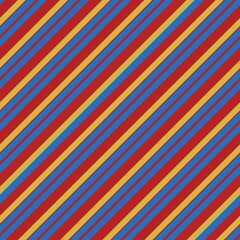 Obraz premium Bold high contrast seamless pattern of diagonal stripes in primary colors blue yellow red The energetic retro look is ideal for sports apparel backpacks packaging or bold home textiles
