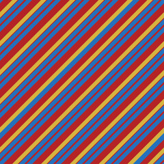 Obraz premium Bold high contrast seamless pattern of diagonal stripes in primary colors blue yellow red The energetic retro look is ideal for sports apparel backpacks packaging or bold home textiles Vector
