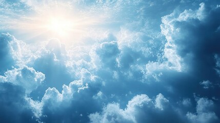 Bright sun shining through fluffy blue and white clouds in a clear sky, evoking a sense of calm and hope