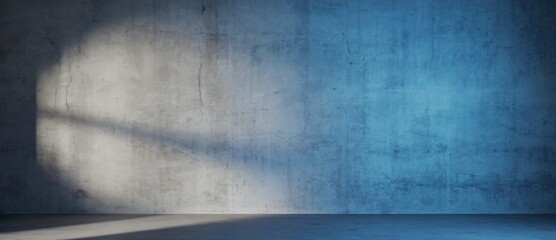A textured concrete wall bathed in soft blue light.