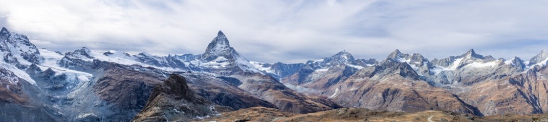 high resolution Panorama view from Gorner Grad on the surrounding mountains and glaciers, with visible Monte Rosa hut, Zermatt, Switzerland