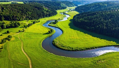 Vibrant Green Valley With A Winding River Under A Clear Blue Sky On A Sunny Day Detailed Scenic Landscape View