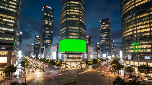 Cityscape at Night with Green Screen Billboard