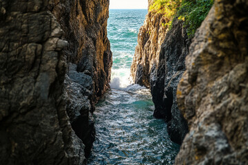 breathtaking view of the seas it crashes through narrow rock passageway