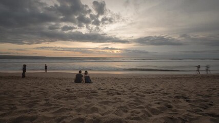 sunset storm sky bali island crowded beach bay panorama timelapse 4k indonesia