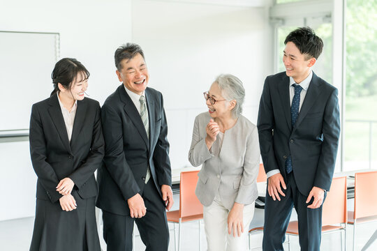 Elderly people, seniors and young people in suits (seminar, training, education, study group, generational change, management)
