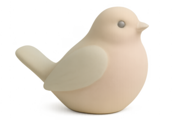 White ceramic bird figurine representing peace on transparent background