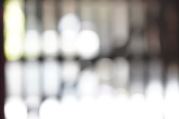 Abstract blurred background with glowing bokeh lights.