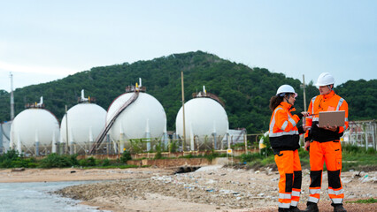Energy professionals plan sustainable operations at a coastal gas terminal. The team uses...