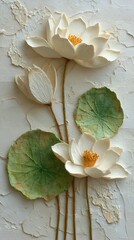 Three dimensional lotus flowers with textured petals and leaves in an elegant floral artistic composition.