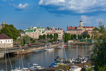 Obraz premium Colorful historic waterfront buildings and marina in Vyborg, Russia