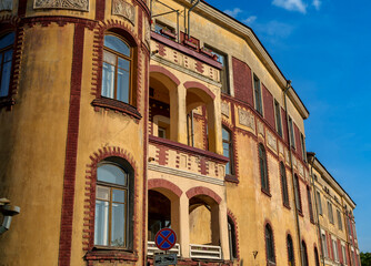 Fototapeta premium Ornate yellow and red Art Nouveau building facade in Vyborg, Russia
