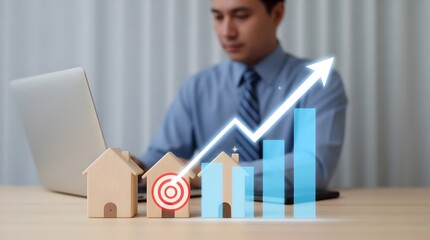 A focused businessman uses a laptop to analyze real estate market trends, aiming for growth and success in property investment with a clear target in mind