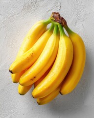Fresh and Ripe Bananas on White Textured Background for Food Photos