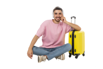 Man in casual wear enjoying music by a suitcase, isolated, PNG