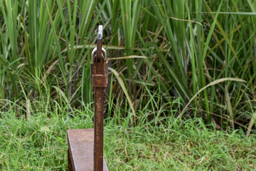 Key to the irrigation water distribution channel door in the rice fields