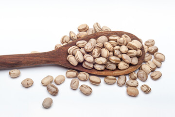 Carioca Beans (Feij&atilde;o Carioca) on wooden spoon, Brazilian staple food