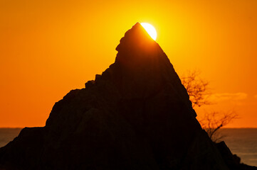 Rising Sun Touching the Peak of Chotdaebawi Rock at Donghae