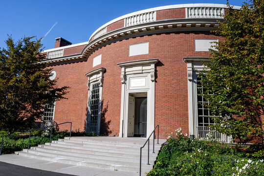 The side view of Houghton Library at Harvard University under blue sky