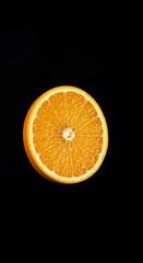 A vibrant, juicy citrus slice floating mid-air, dramatically isolated against a deep, pure black background with sharp focus ,juicy ,dark ,refreshing