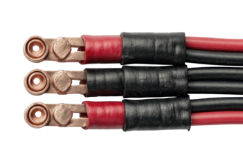Close-up of three copper connectors with red and black wires