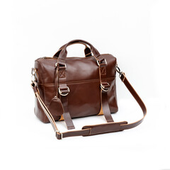 Beautiful dark brown leather bag for women on white background