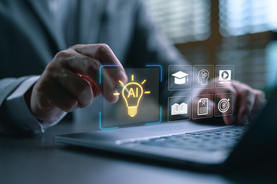 Close-up of hand touching AI lightbulb icon with digital education interface, representing artificial intelligence in learning, smart education system, and innovative e-learning technology. - Powered by Adobe