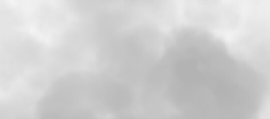 An abstract image featuring a pattern of variously sized, soft-edged gray clouds against