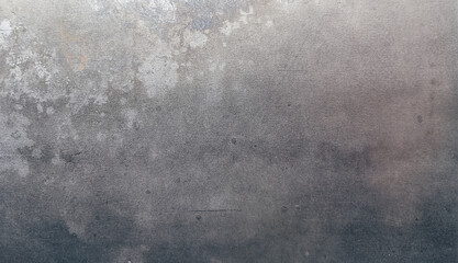 Close-up of brushed metallic steel surface with natural stains and subtle texture, perfect for industrial background, design mockup, or creative visual projects.
