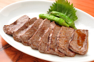 Sliced Grilled Beef Tongue with Shishito Peppers