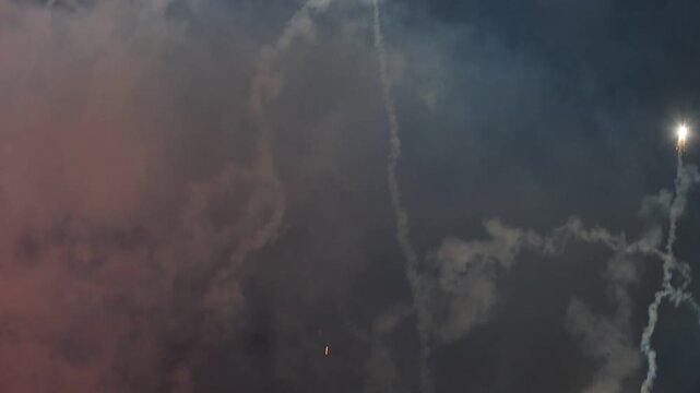 4k Fireworks on the dark sky background. Colorful fireworks. Abstract colored firework background with free space for text. fireworks light up the night sky
