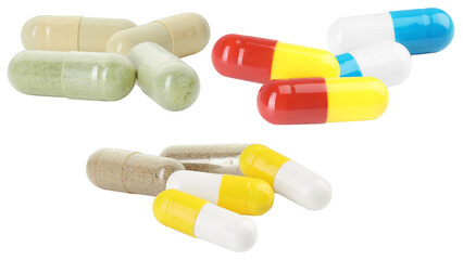 a close-up photograph showcasing a colorful assortment of hard shell pharmaceutical capsules and dietary supplements piled together and isolated on a deep transparent background.