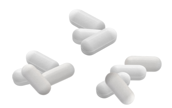 realistic photograph showcasing three distinct groupings of white, oblong pharmaceutical tablets clustered and scattered against a clean, deep transparent background.