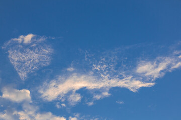 Fototapeta premium Heart-Shaped Cloud in the Blue Sky