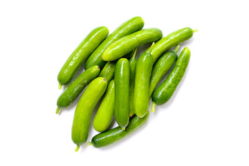 Fresh mini baby cucumbers on white background
