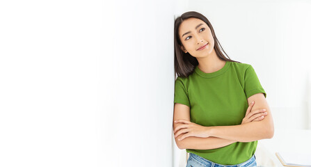 Portrait of beautiful Asian young girl leaning wall with copy space isolated on white background. Positive happy beauty woman, new generation young power people business education successful concept