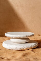 A calming display featuring a stack of serene, rounded stones set against a sandy desert backdrop.