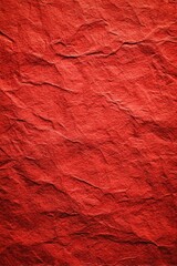 Intense red paper texture, crinkled and captivating. The vibrant hue adds depth and visual appeal.