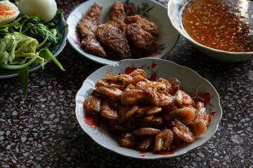 Close-up of Vietnamese caramelized shrimp (tôm rim) in a sweet and savory sauce