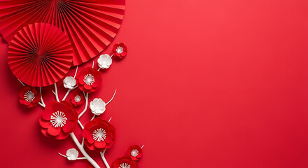 Obraz premium Red paper fans and flowers arranged on a red background, chinese new year decoration