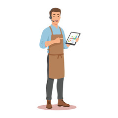 Male worker in an apron and headset pointing at a business chart on a digital tablet.
