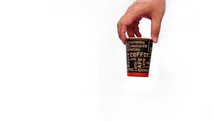 hand holding a coffee paper cup isolated on white background.