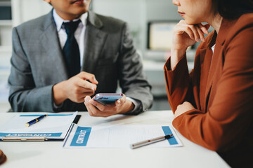 business people and lawyers discussing contract papers sitting at the table. Concepts of law, advice, legal services. in morning light
