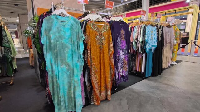 Sepang, Malaysia - November 2, 2025: Malaysian Batik clothing, from daily wear to premium apparel, is displayed for sale at KLIA2. These unique, handcrafted batik patterns showcase local artistry.