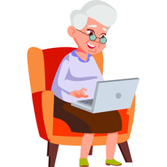 Elderly Woman With White Hair And Glasses Sitting In An Orange Armchair Using A Silver Laptop Computer With A Light Blue Sweater And Brown Skirt