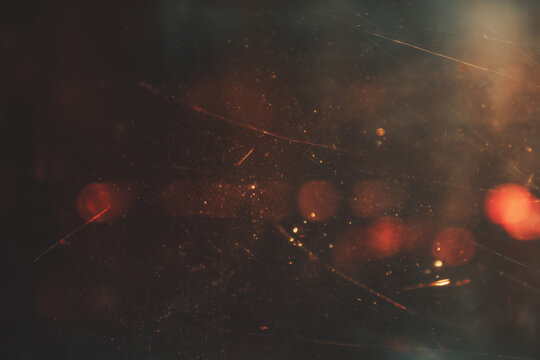 Abstract background with light specks and scratches. Perfect for design projects, web backgrounds, overlays, and artistic compositions. Versatile and unique.