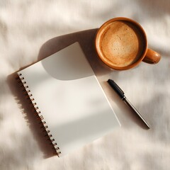 flat lay of creative workspace with notebook, pen, and coffee, minimal design, soft shadows