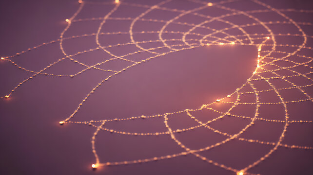 Glowing spiderweb with dewdrops illuminated against a soft purple background - Powered by Adobe